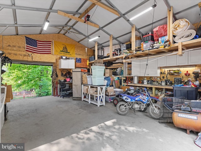 garage with a workshop area