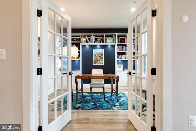 7679 Cross Creek Dr, Columbia, MD 21044 - office area featuring french doors, wood finished floors, and plenty of natural light