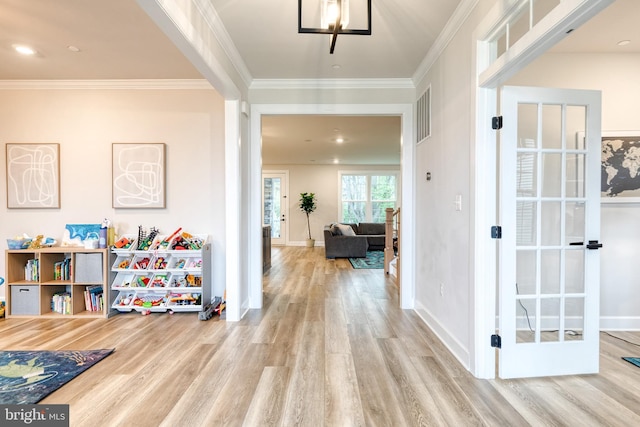7679 Cross Creek Dr, Columbia, MD 21044 - entryway featuring wood finished floors, baseboards, and ornamental molding