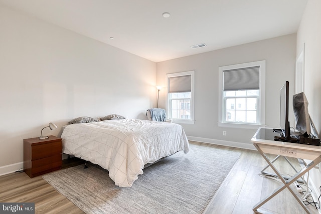 7679 Cross Creek Dr, Columbia, MD 21044 - bedroom with light wood-style flooring and baseboards