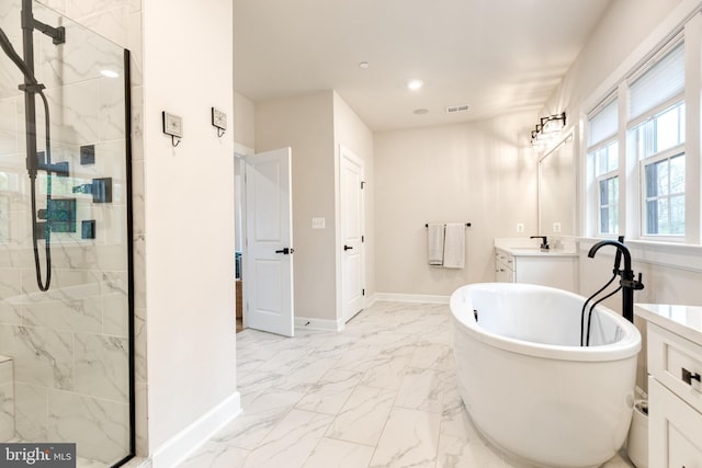 7679 Cross Creek Dr, Columbia, MD 21044 - bathroom featuring a shower stall, baseboards, marble look tiles, a freestanding tub, and vanity