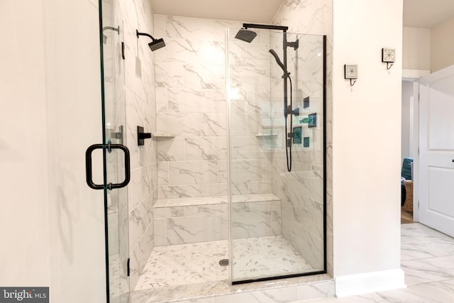 7679 Cross Creek Dr, Columbia, MD 21044 - bathroom featuring marble finish floors, a marble finish shower, and baseboards