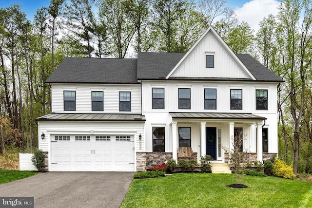 7679 Cross Creek Dr, Columbia, MD 21044 - view of front facade featuring a standing seam roof, driveway, a garage, and a shingled roof