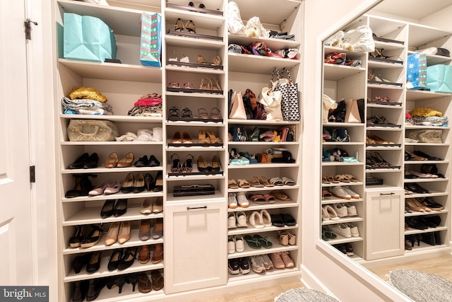 7679 Cross Creek Dr, Columbia, MD 21044 - walk in closet with wood finished floors