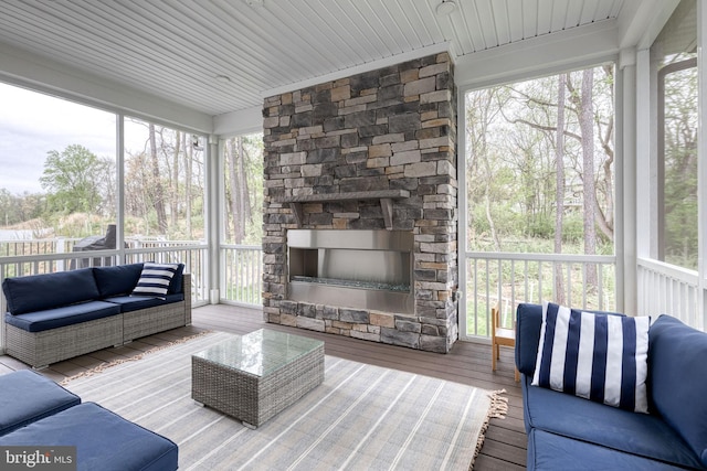 7679 Cross Creek Dr, Columbia, MD 21044 - sunroom / solarium with an outdoor living space with a fireplace and plenty of natural light
