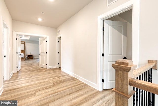7679 Cross Creek Dr, Columbia, MD 21044 - hall featuring light wood-style floors, baseboards, an upstairs landing, and recessed lighting