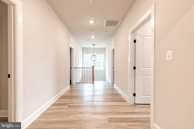 7679 Cross Creek Dr, Columbia, MD 21044 - hallway with light wood-type flooring, an upstairs landing, baseboards, and recessed lighting