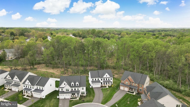 7679 Cross Creek Dr, Columbia, MD 21044 - aerial view of residential area with a forest