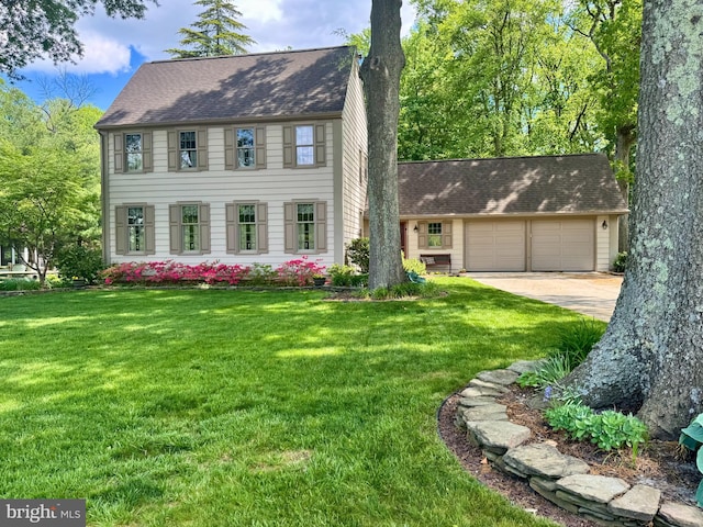 1149 Ollerton Rd, West Deptford, NJ 08066 - colonial-style house with concrete driveway, a front lawn, and an attached garage