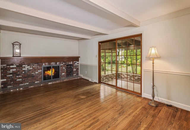 1149 Ollerton Rd, West Deptford, NJ 08066 - unfurnished living room with beamed ceiling, baseboards, wood finished floors, and a fireplace