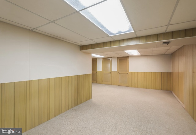 1149 Ollerton Rd, West Deptford, NJ 08066 - finished basement featuring a paneled ceiling, carpet floors, wainscoting, and wooden walls