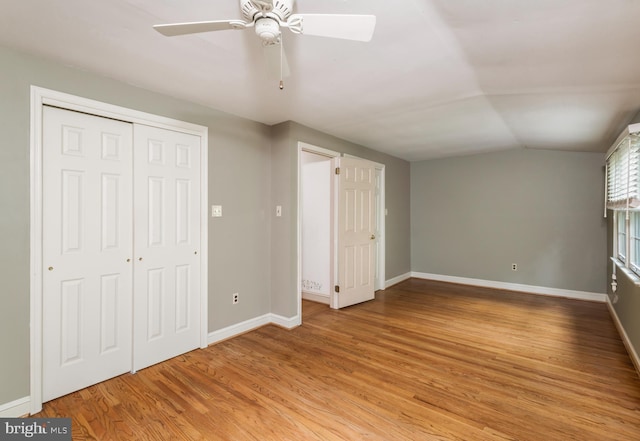 1149 Ollerton Rd, West Deptford, NJ 08066 - unfurnished bedroom with baseboards, light wood-style floors, lofted ceiling, and a closet