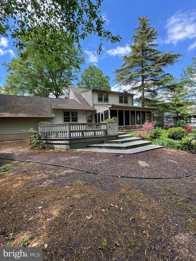1149 Ollerton Rd, West Deptford, NJ 08066 - rear view of property featuring a sunroom and a wooden deck