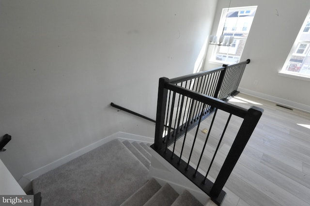 12371 Sea Oaks Ln Unit 1, Berlin, MD 21811 - staircase with baseboards and wood finished floors