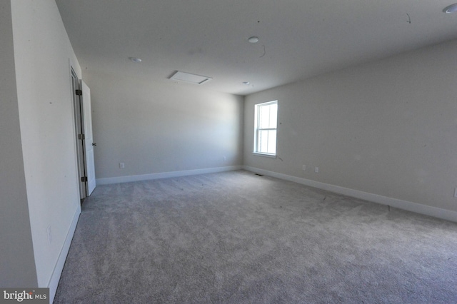 12371 Sea Oaks Ln Unit 1, Berlin, MD 21811 - spare room featuring light carpet and baseboards