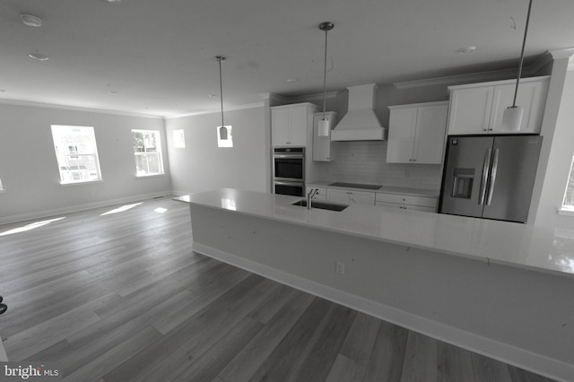12371 Sea Oaks Ln Unit 1, Berlin, MD 21811 - kitchen featuring appliances with stainless steel finishes, premium range hood, ornamental molding, white cabinetry, and baseboards