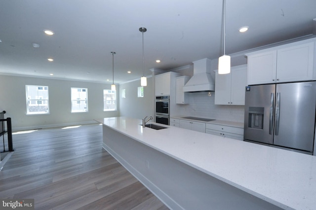 12371 Sea Oaks Ln Unit 1, Berlin, MD 21811 - kitchen with appliances with stainless steel finishes, custom exhaust hood, white cabinets, recessed lighting, and a sink