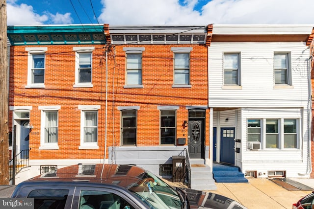 1545 S 19th St, Philadelphia, PA 19146 - townhome / multi-family property featuring cooling unit, brick siding, and entry steps