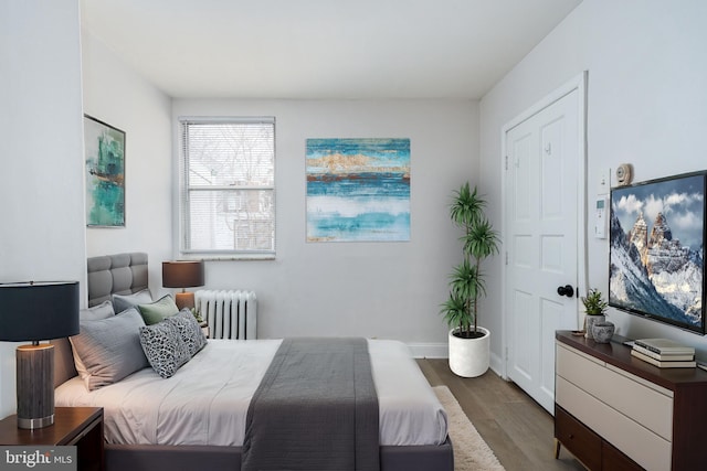 1545 S 19th St, Philadelphia, PA 19146 - bedroom featuring radiator, wood finished floors, and baseboards