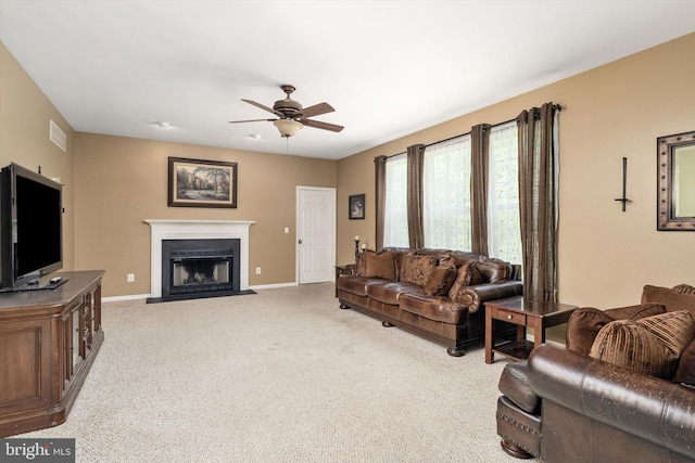 21 Jimarie Ct, Hamilton, NJ 08620 - living room with a ceiling fan, a fireplace with flush hearth, light colored carpet, and baseboards