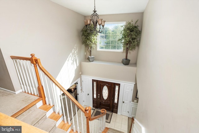 21 Jimarie Ct, Hamilton, NJ 08620 - foyer with a chandelier, a high ceiling, stairs, and baseboards