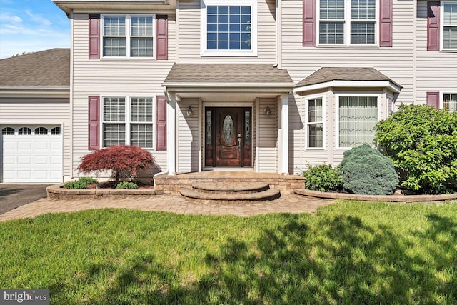 21 Jimarie Ct, Hamilton, NJ 08620 - view of front of house featuring an attached garage, a front yard, a shingled roof, and driveway