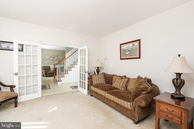 21 Jimarie Ct, Hamilton, NJ 08620 - living room with french doors, carpet floors, and stairs