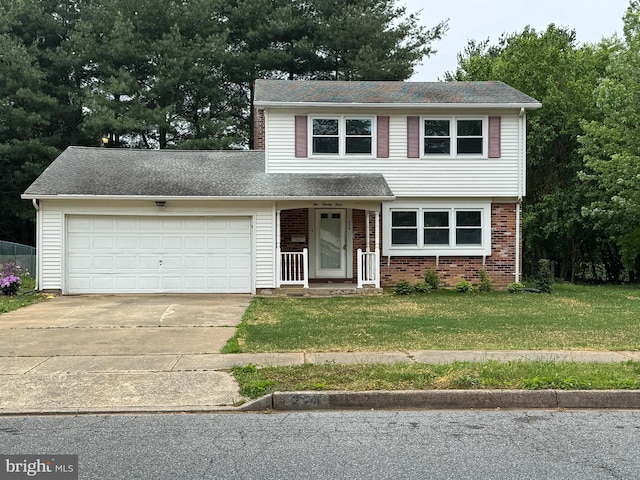 traditional-style home featuring an attached garage, a shingled roof, a front yard, brick siding, and driveway