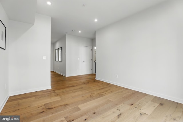 4140 Legato Rd Unit 47, Fairfax, VA 22033 - unfurnished room with recessed lighting, light wood-type flooring, baseboards, and a pendent fire sprinkler