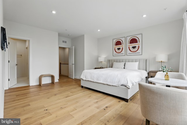 4140 Legato Rd Unit 47, Fairfax, VA 22033 - bedroom featuring light wood-style flooring, recessed lighting, and baseboards