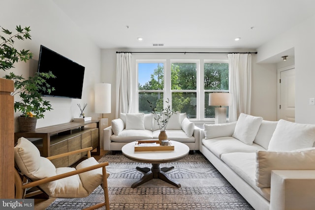 4140 Legato Rd Unit 47, Fairfax, VA 22033 - living room with recessed lighting and wood finished floors