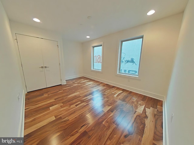 117 Quarry St Unit 9, Philadelphia, PA 19106 - unfurnished bedroom featuring wood finished floors, recessed lighting, baseboards, and a closet