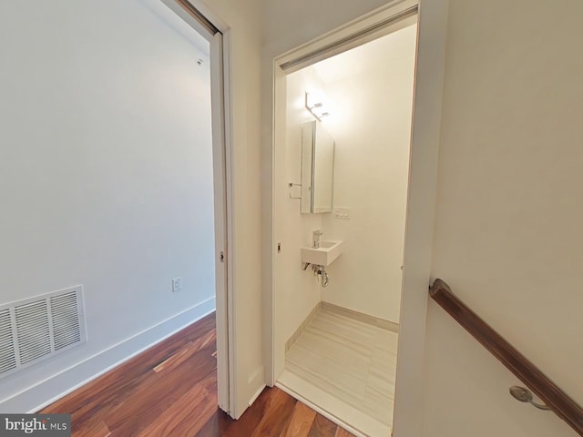 117 Quarry St Unit 9, Philadelphia, PA 19106 - hallway featuring dark wood finished floors and baseboards