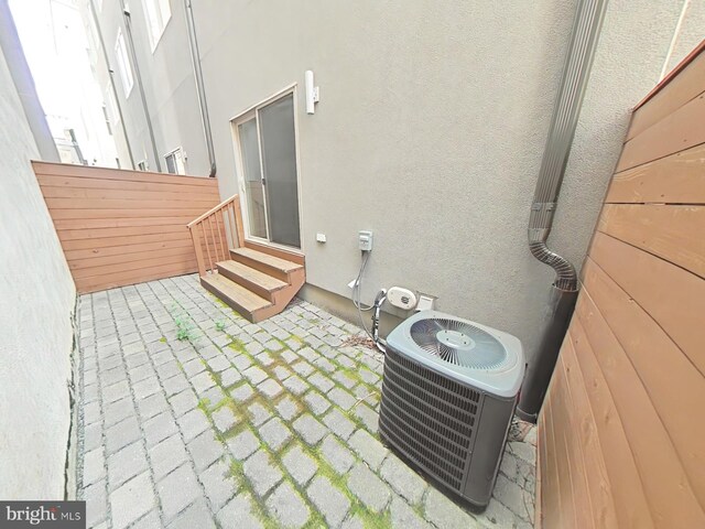 117 Quarry St Unit 9, Philadelphia, PA 19106 - view of patio with entry steps and central AC