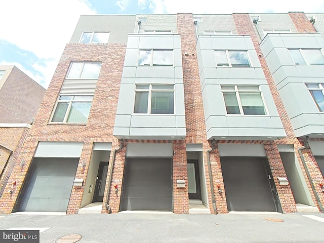 117 Quarry St Unit 9, Philadelphia, PA 19106 - view of building exterior with an attached garage