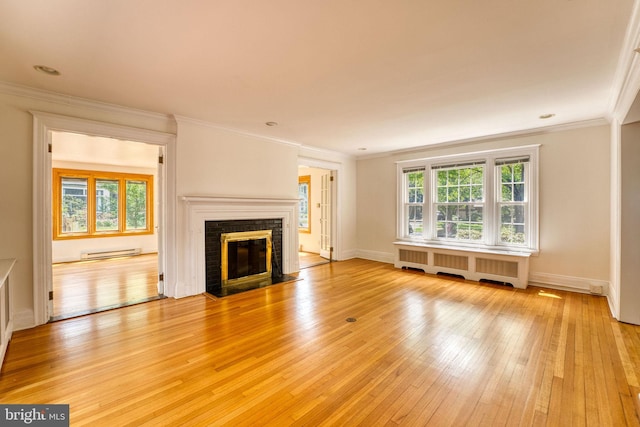 2305 Macdonough Rd, Wilmington, DE 19805 - unfurnished living room featuring radiator, plenty of natural light, light wood-style floors, a brick fireplace, and ornamental molding