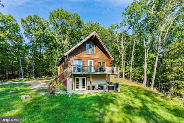 1276 Birch Grove Ln, Berkeley Springs, WV 25411 - back of property featuring french doors, a deck, a yard, and a patio area