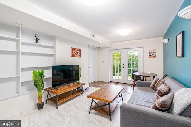 1276 Birch Grove Ln, Berkeley Springs, WV 25411 - living area with french doors, built in features, an office area, and light marble finish floors