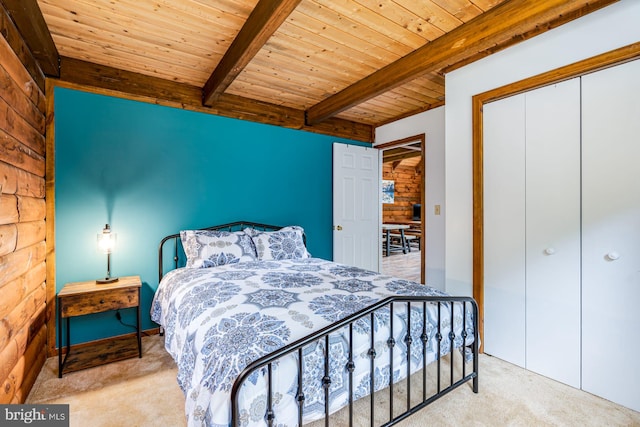 1276 Birch Grove Ln, Berkeley Springs, WV 25411 - carpeted bedroom featuring wooden ceiling, beamed ceiling, and a closet