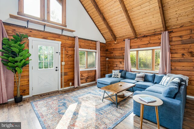 1276 Birch Grove Ln, Berkeley Springs, WV 25411 - living room featuring wooden ceiling, high vaulted ceiling, healthy amount of natural light, beam ceiling, and wood walls
