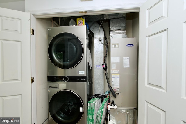 7313 Split Rail Ln, Laurel, MD 20707 - washroom featuring stacked washer and clothes dryer