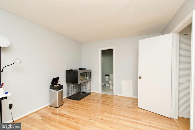 7313 Split Rail Ln, Laurel, MD 20707 - unfurnished living room with wood finished floors and baseboards