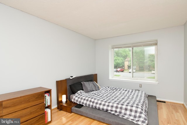 7313 Split Rail Ln, Laurel, MD 20707 - bedroom with wood finished floors and baseboards