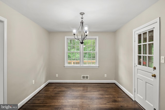 12904 Two Farm Dr, Silver Spring, MD 20904 - unfurnished dining area with dark wood finished floors, baseboards, and a chandelier