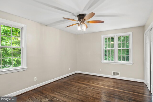 12904 Two Farm Dr, Silver Spring, MD 20904 - empty room featuring baseboards, ceiling fan, and dark wood-type flooring