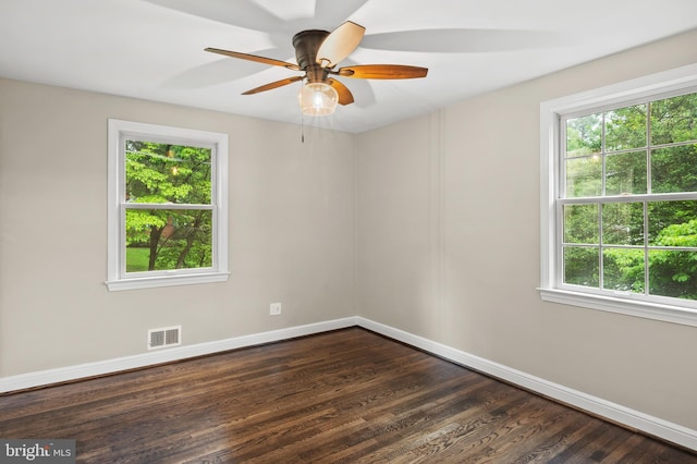 12904 Two Farm Dr, Silver Spring, MD 20904 - spare room with plenty of natural light, baseboards, and dark wood finished floors