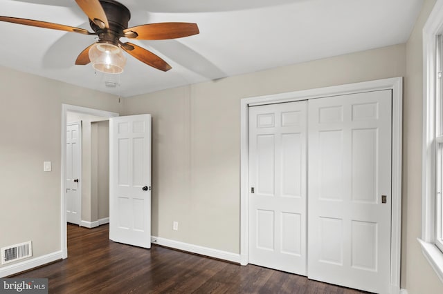 12904 Two Farm Dr, Silver Spring, MD 20904 - unfurnished bedroom with dark wood-type flooring, baseboards, a closet, and ceiling fan