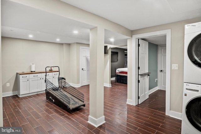 12904 Two Farm Dr, Silver Spring, MD 20904 - laundry area featuring estacked washer and dryer, wood finish floors, baseboards, and recessed lighting