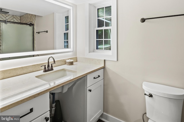 12904 Two Farm Dr, Silver Spring, MD 20904 - bathroom featuring vanity, toilet, and a shower with shower door