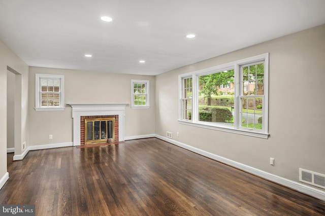 12904 Two Farm Dr, Silver Spring, MD 20904 - unfurnished living room featuring baseboards, dark wood-type flooring, a fireplace, and recessed lighting